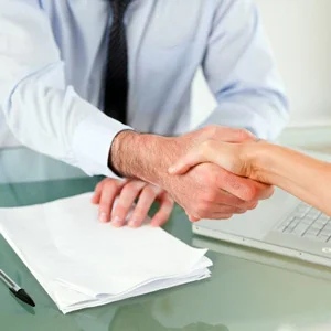 two people shaking hands